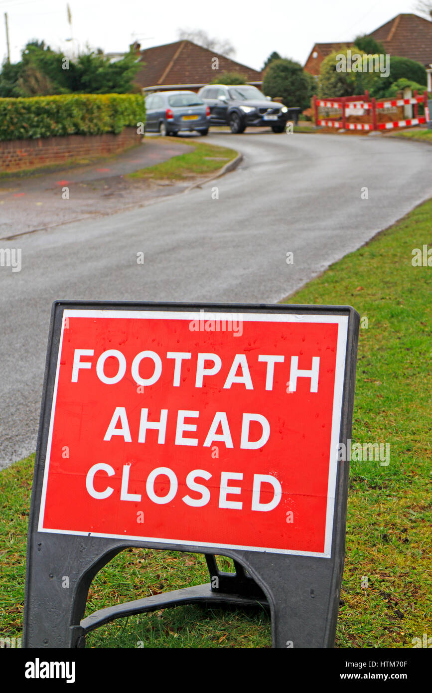 Footpath Ahead Closed sign for road works by minor road in Hellesdon