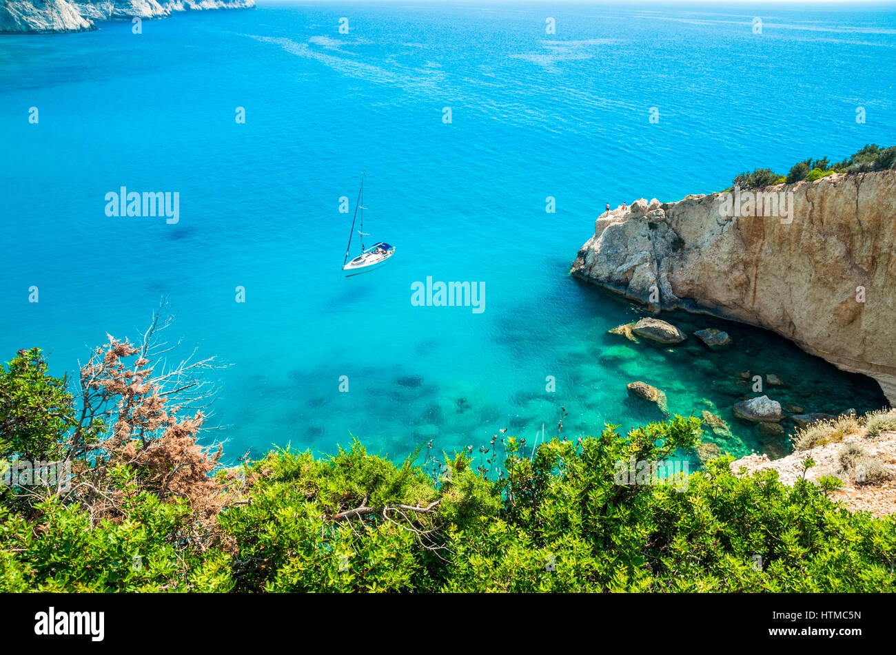 Porto Katsiki beach in Lefkada island, Greece. Luxury yacht on a blue sea. Stock Photo