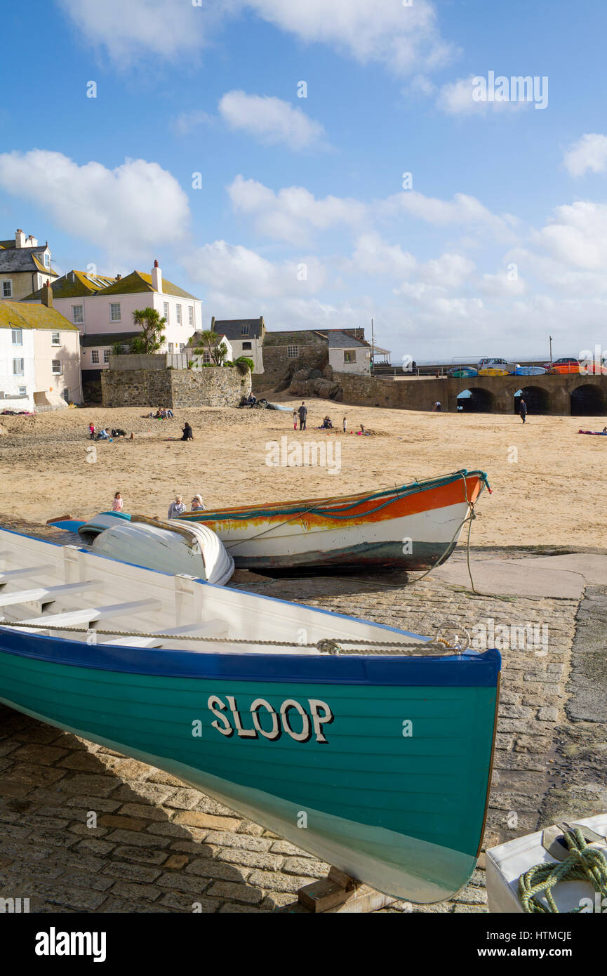St. Ives harbour beach with the bow of the gig boat Sloop in the foreground, Cornwall England UK. Stock Photo