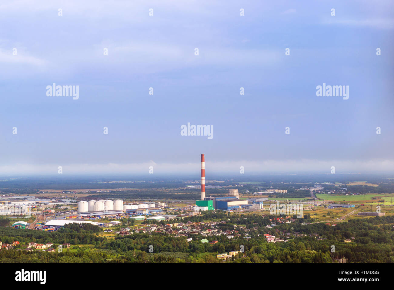 View from heights of Tallinn TV tower on Iru power plant, Eesti Energia. Types and horizons of Baltic cities with altitude. Cloudy overcast sky and ha Stock Photo