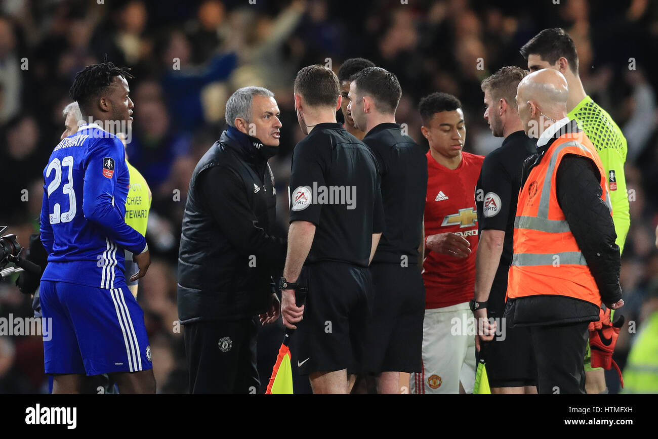 Manchester United manager Jose Mourinho speak to referee Michael Oliver ...