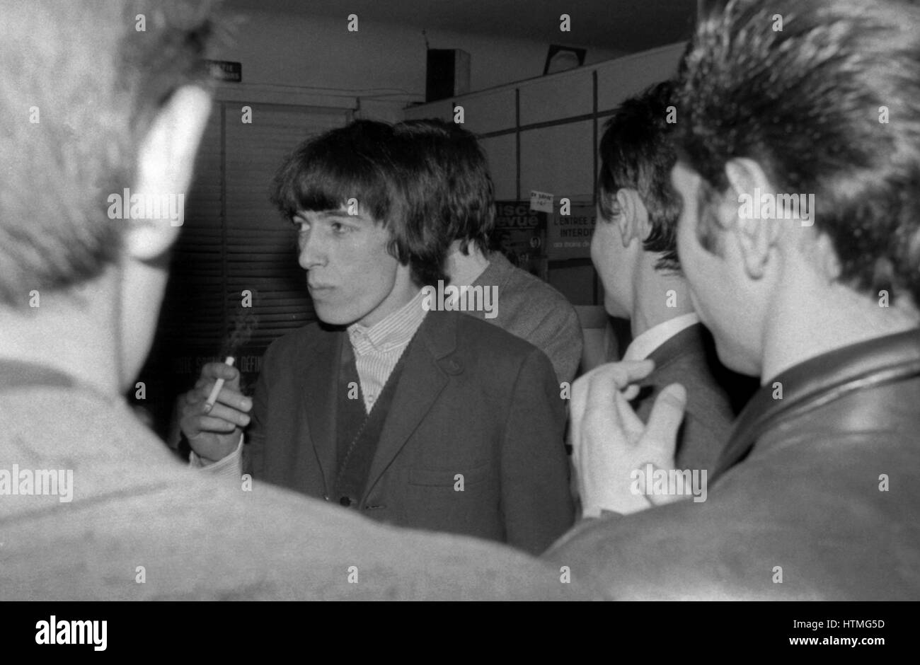 Bill Wyman, member of the Rolling Stones, in the backstages of the Golf-Drouot in Paris in 1965. Stock Photo
