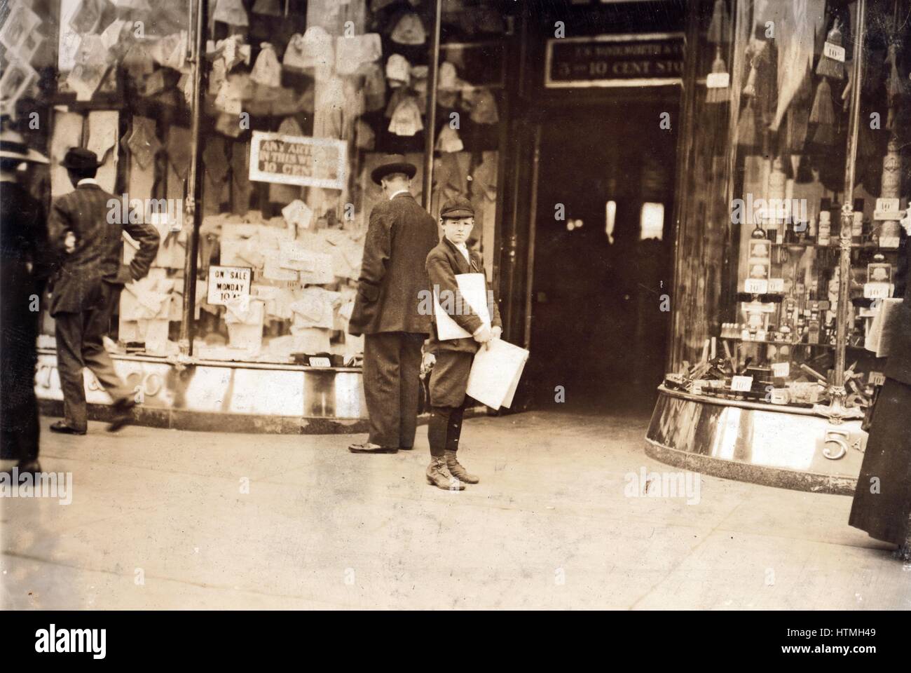 A young truant selling extras during school hours. Pennsylvania Avenue New York 1911 Stock Photo