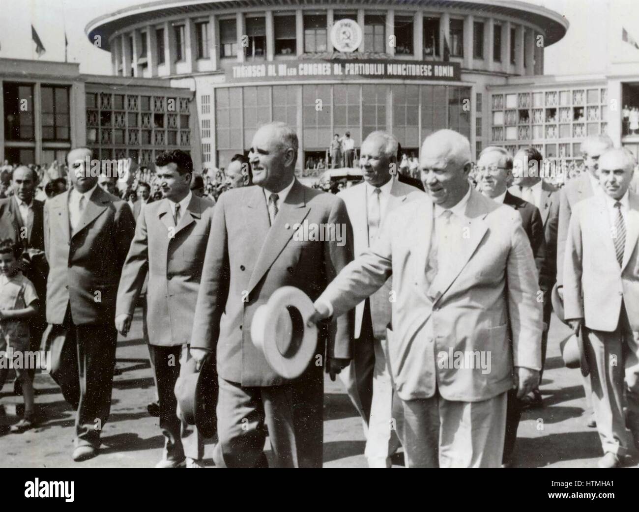 Romanian communist leader Gheorghe Gheorghiu-Dej (front row, left) seeing off Soviet leader Nikita Khrushchev (front row, right) upon the close of the Romanian Communist Party's 7th Congress 1959 at Bucharest's Baneasa Airport. The image also shows Gheorg Stock Photo