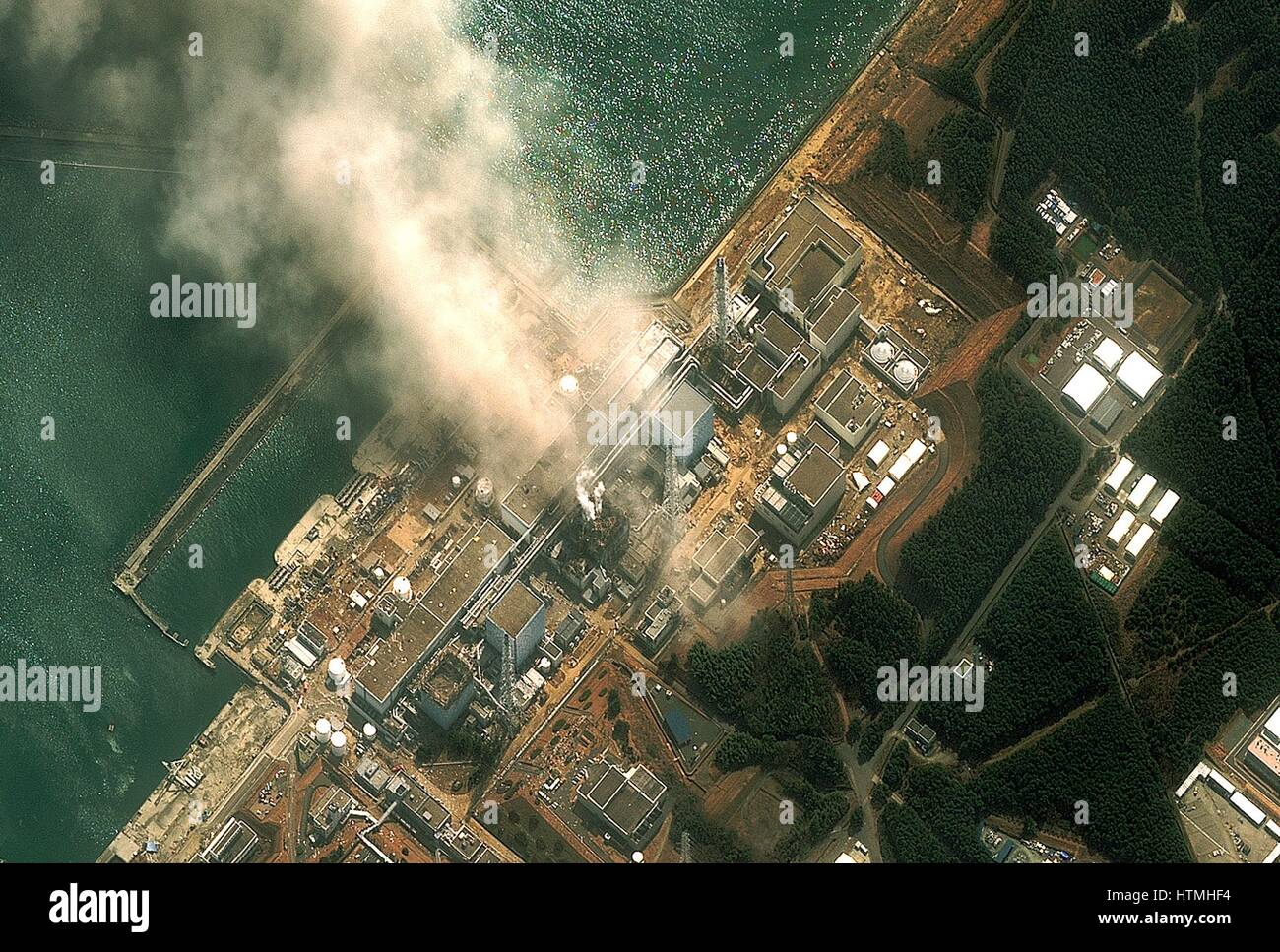 Fukushima Daiichi reactor in North eastern Japan 2011 Satellite view of earthquake damage to the reactors march14th 2011 Stock Photo