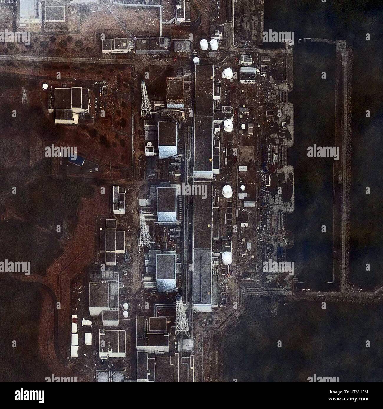 Fukushima Daiichi reactor in North eastern Japan 2011 Satellite view of earthquake damage to the reactors march15th 2011 Stock Photo