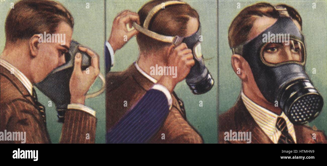 'Air Raid Precautions': Set of 50 cards issued by WD & H0 Wills, Britain 1938, in preparation for the anticipated coming of World War II. The Civilian Respirator (gasmask) which was supplied free to all members of the British public. How to put on and adj Stock Photo