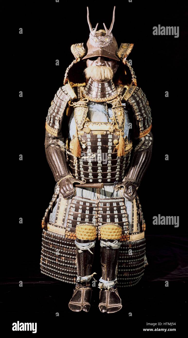Suit of Japanese armour. Antlers from deer are mounted on the helmet. Mid 16th century Stock Photo