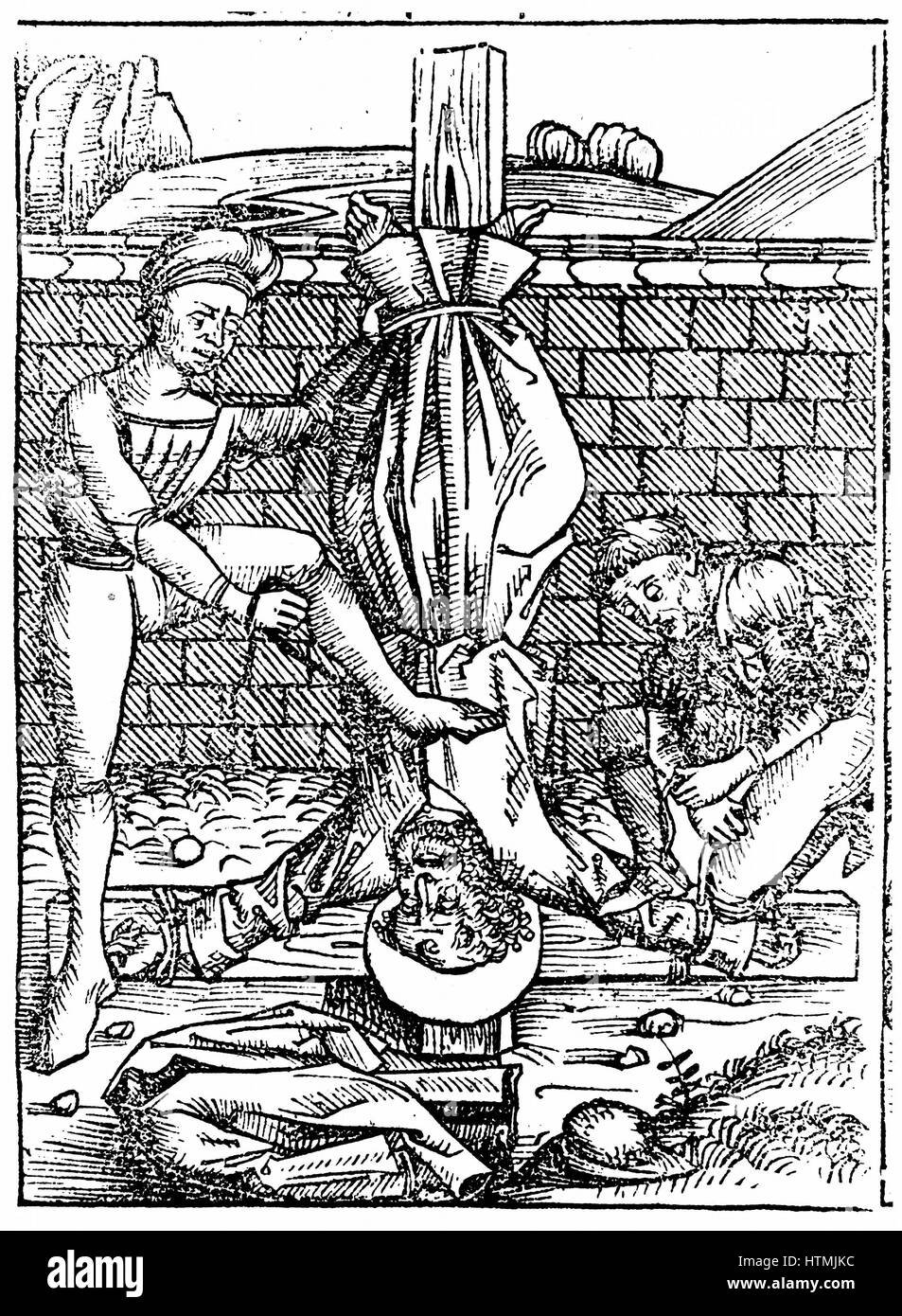 Martyrdom of St Peter who is said to have been crucified at Rome with head, not feet, nearest the ground. From Hartmann Schedel 'Liber chronicarum mundi' (Nuremberg Chronicle) Nuremberg, 1495. Woodcut Stock Photo
