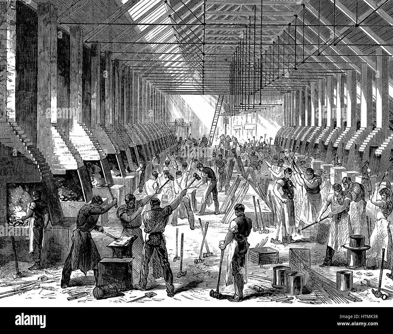 The Railway Carriage Company's works, Oldbury. The forge, showing mass production of components at about 40 identical forges. Wood engraving 1869 Stock Photo