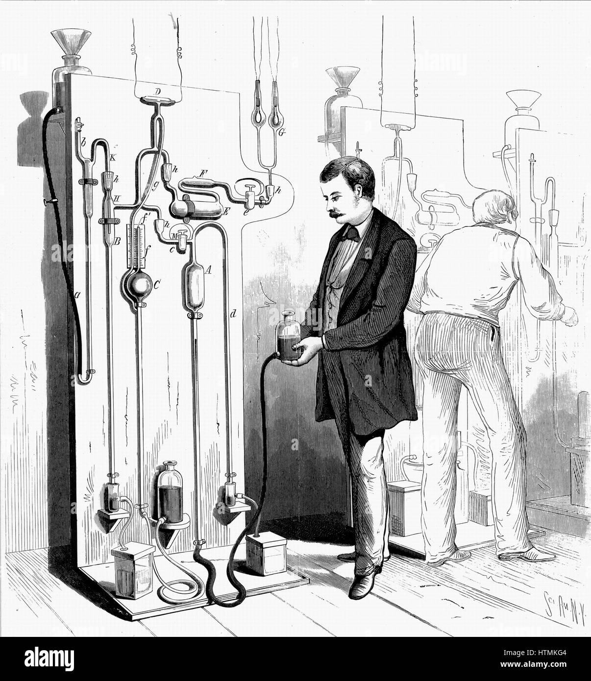 Vacuum apparatus used to exhaust Edison incandescent light bulbs at G (centre top). From Scientific American, New York, 1880. Engraving Stock Photo