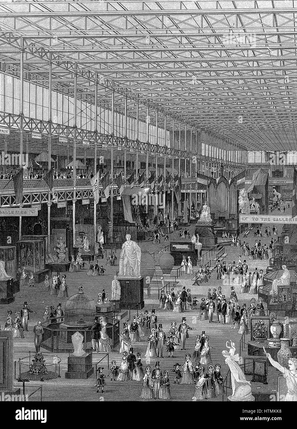 Great Exhibition of 1851, Crystal Palace, Hyde Park, London. Interior view of main avenue looking east, showing galleries supported by iron columns rising to ridge-and-furrow glass roof. Steel engraving of 1851 Stock Photo