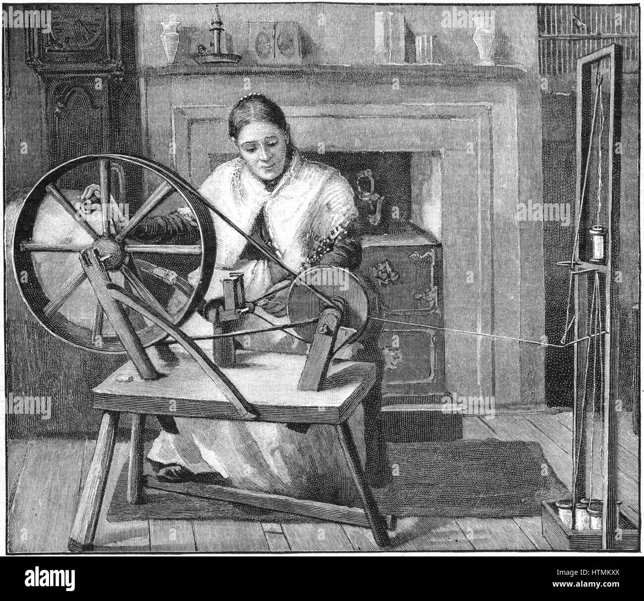 Spitalfields silk worker winding silk in her cottage, London, England, late 19th century. This enclave of the silk industry was founded by Huguenot refugees from France after Louis XIV's Revocation of the Edict of Nantes (1685). Engraving, 1893 Stock Photo