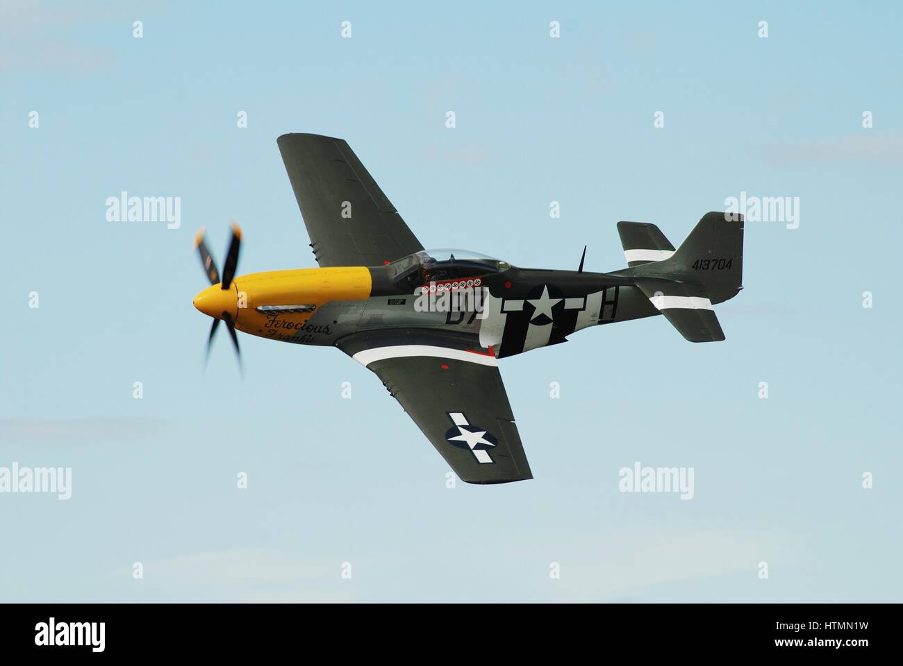 Mustang P-51D fighter plane Ferocious Frankie displays at the Dunsfold airshow in Surrey, England. The Second World War aircraft was built in 1944. Stock Photo