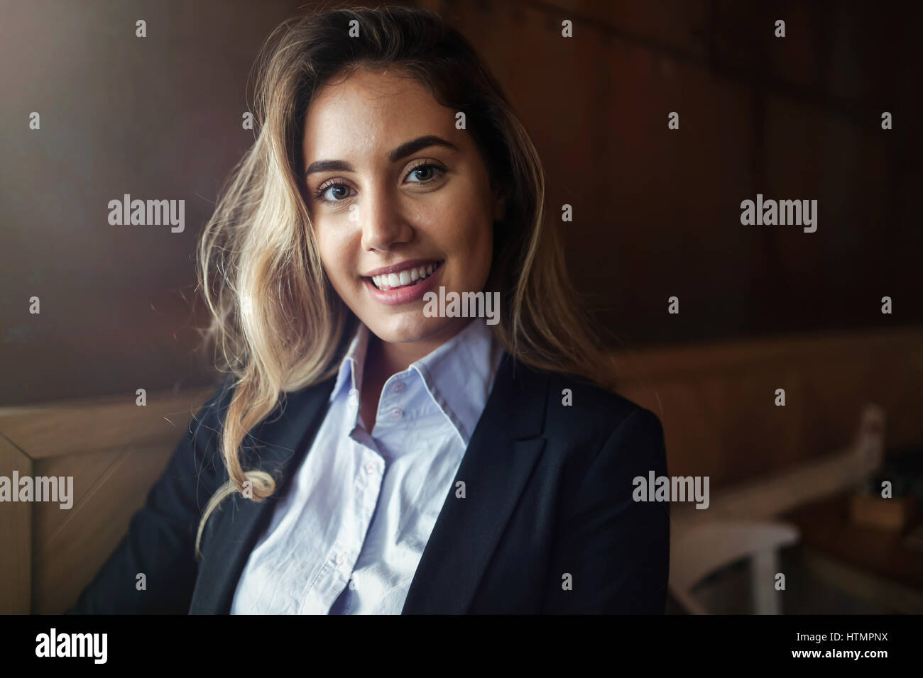 Beautiful blond business woman in shirt and suit Stock Photo - Alamy