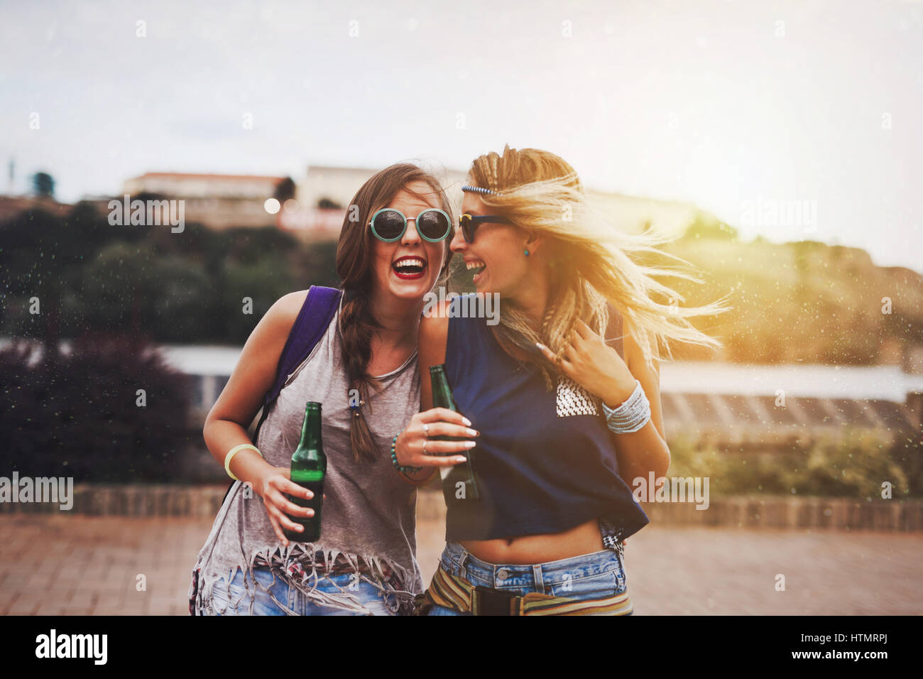 Party girls enjoying summer freedom and festival fun Stock Photo
