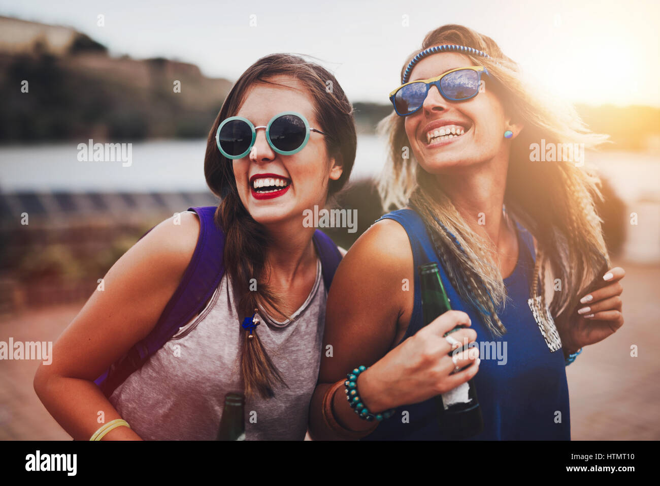 Party girls enjoying summer freedom and festival fun Stock Photo