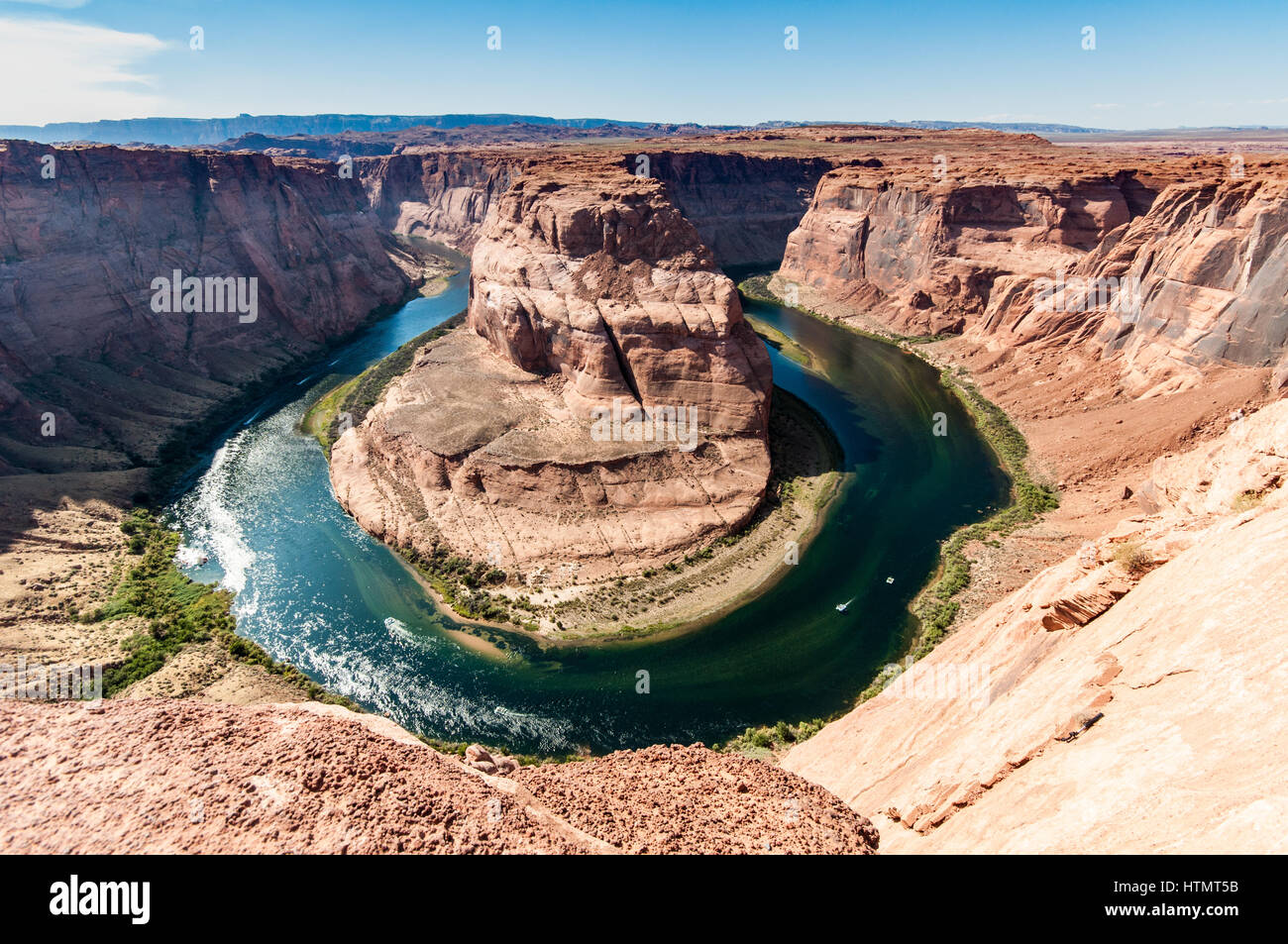 Horseshoe Bend. Horseshoe bend in the Colorado river close to the town of Page, Arizona. The river is around 1000 feet below the plateau Stock Photo