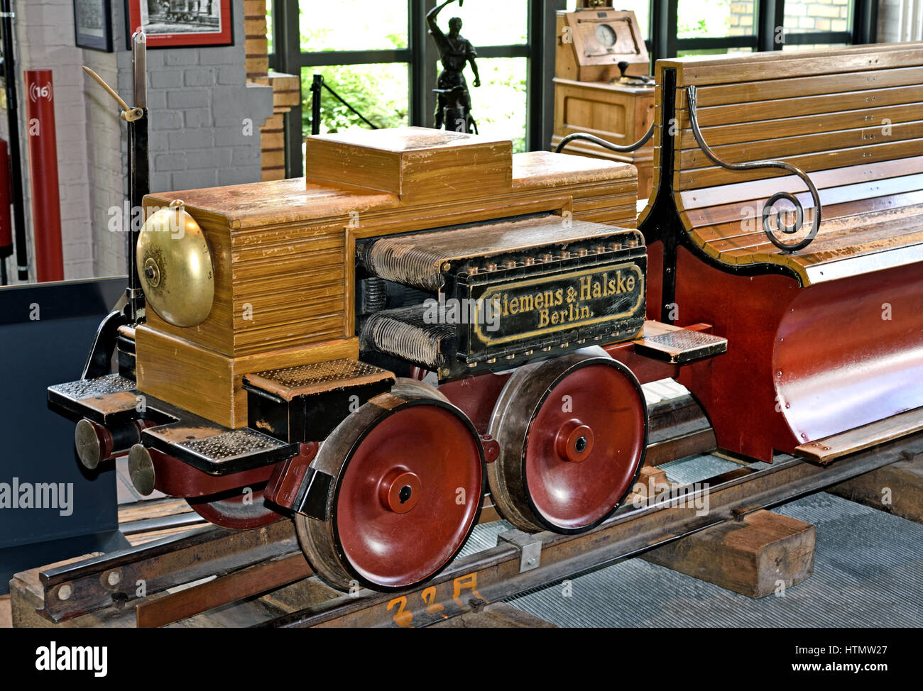 Siemens Elektromotive von 1879 ( Replica of the Siemens exhibition train from 1879 ) Museum of Technology (The Deutsches Technikmuseum, scientific and technical collection. ) Germany  Berlin Kreuzberg  ( In 1879, Werner Siemens built a railroad track and a two-axle electric locomotive in Berlin. It was supplied with power by a stationary dynamo via an insulated power rail, which was installed in the middle of the track ) Stock Photo