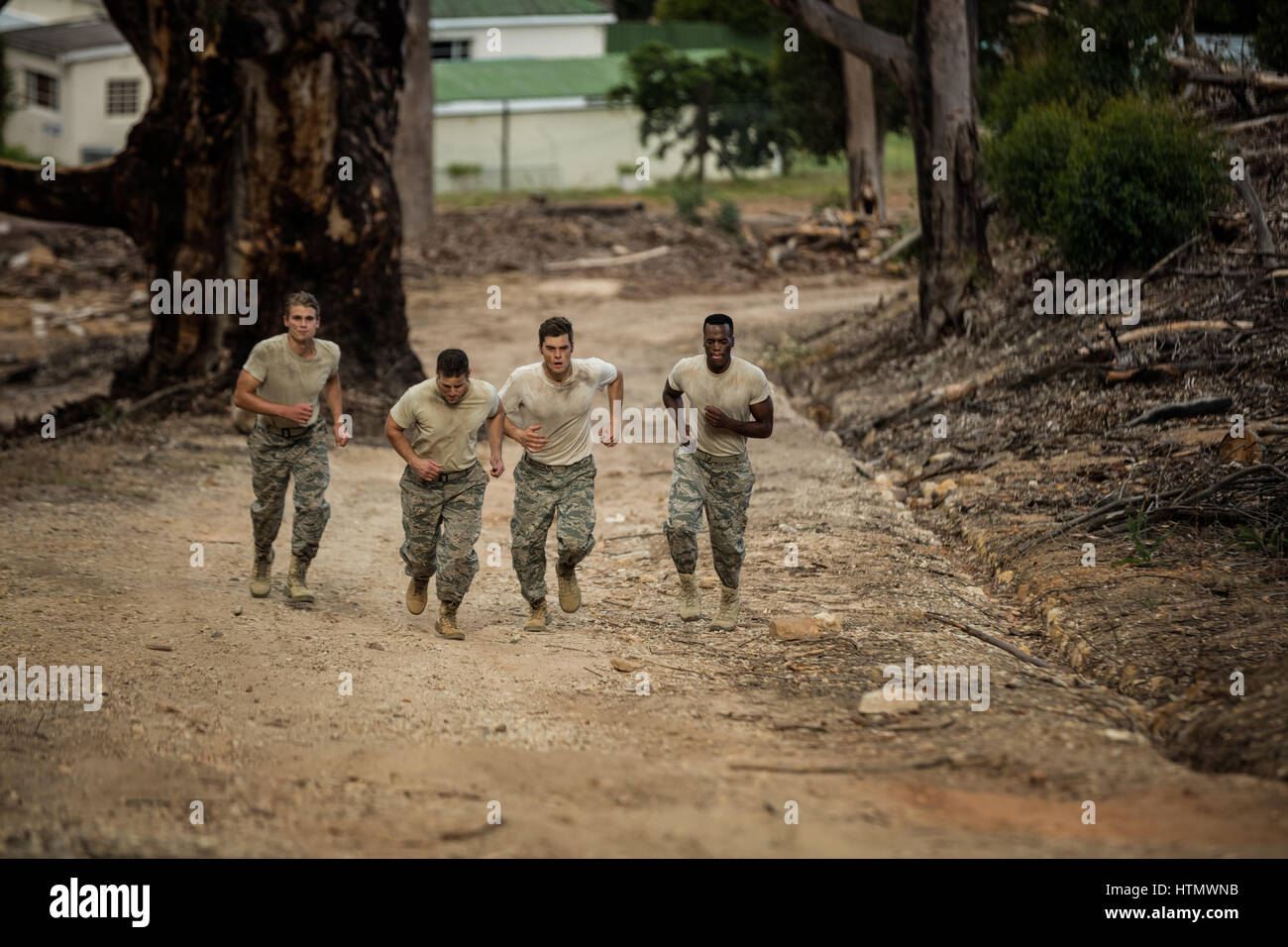 Soldiers running in boot camp Stock Photo