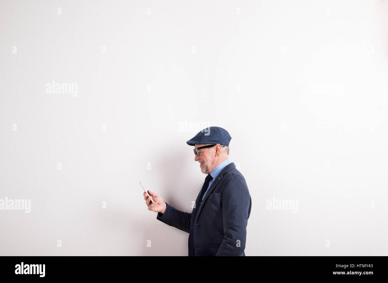 Man in cap blue shirt hi-res stock photography and images - Alamy