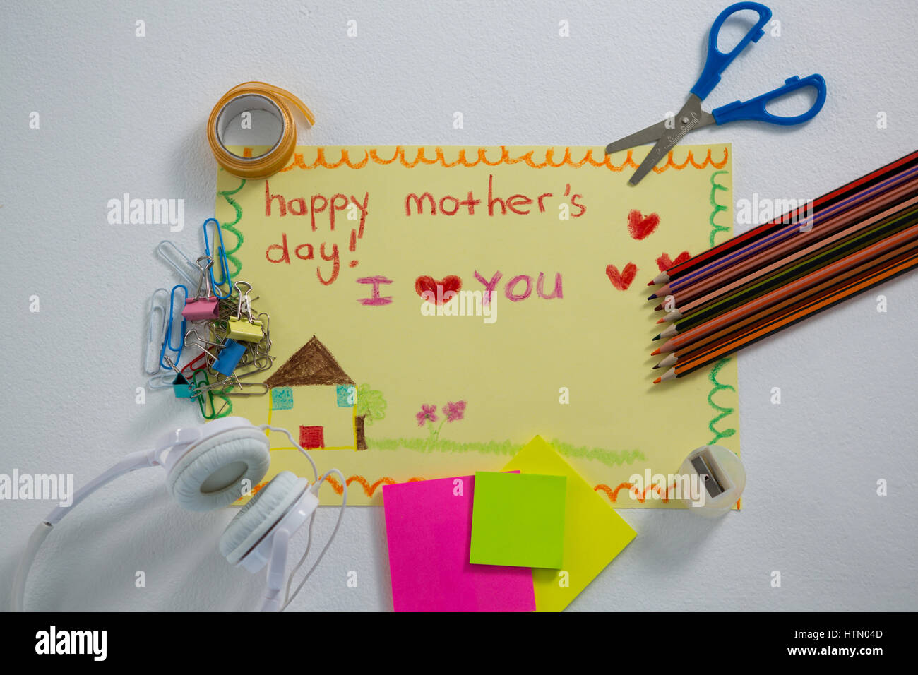 Stationery with happy mothers day greetings card on white background Stock Photo