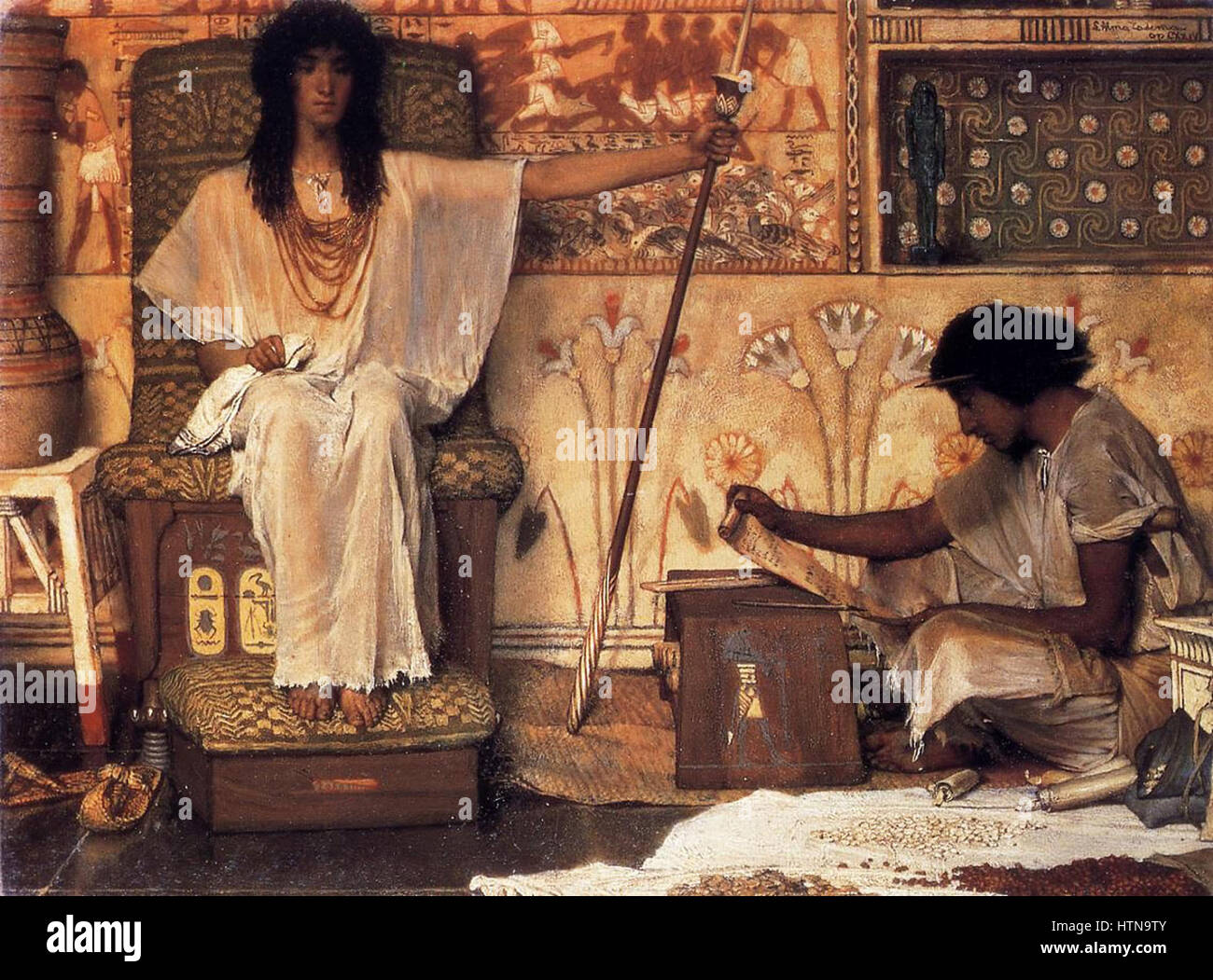 This 1874 artwork titled 'Joseph Overseer of Pharaoh's Granaries' portrays the biblical figure Joseph overseeing the granaries in Egypt. The scene is painted in historical style, illustrating Joseph’s role in the biblical narrative during a time of famine. Stock Photo