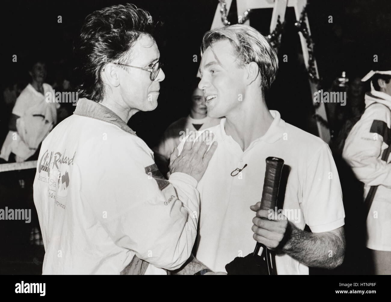 Cliff Richard at the Brighton Centre in the late 1980s - at his recently launched tennis charity called Search for a Star. Pictured here with Jason Donovan. Stock Photo