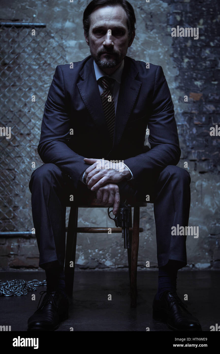 Evil man in suit hi-res stock photography and images - Alamy