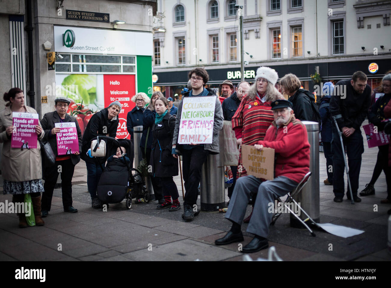 Cardiff, UK. 13th March, 2017. An emergency protest was held to defend EU Citizens' Right to Remain in the UK following the Brexit referendum and the parliamentary debate. Held in Queen Street, Cardiff, the event was addressed by EU citizens presently living in the city as well as activists. Credit: Taz Rahman/Alamy Live News Stock Photo