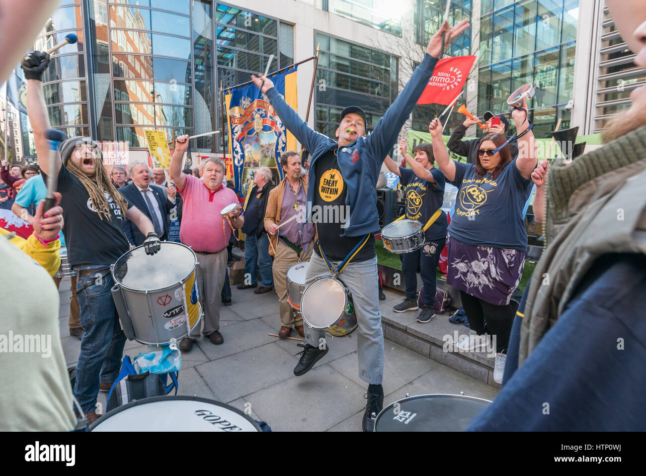 London, UK. 13th March 2017. The PCS Samba band gave tremendous support to the Orgreave Truth and Justice Campaign protest at the Home Office after the shocking decision by Home Secretary Amber Rudd not to grant an inquiry into the 'Battle of Orgreave', when police, including military police and others in police uniforms, mounted a carefully planned attack on picketing miners. Campaigners believe the attack was coordinated by the Tory government under Margaret Thatcher with the collusion of the media who distorted their coverage in a deliberate attempt to break the strike, and that the inquiry Stock Photo