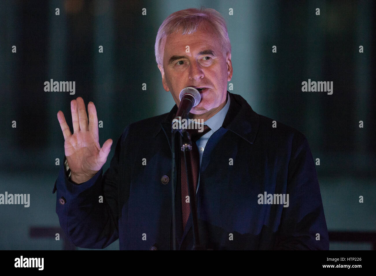 London, UK. 13th March, 2017. John McDonnell, Shadow Chancellor, addresses a protest in Parliament Square in defence of EU citizens' right to remain in the UK whilst MPs inside the House of Commons debate and vote on whether or not the Brexit bill should pass unamended back to the House of Lords. Stock Photo