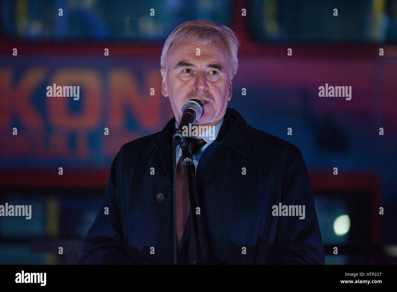 London, UK. 13th March, 2017. John McDonnell, Shadow Chancellor, addresses a protest in Parliament Square in defence of EU citizens' right to remain in the UK whilst MPs inside the House of Commons debate and vote on whether or not the Brexit bill should pass unamended back to the House of Lords. Stock Photo