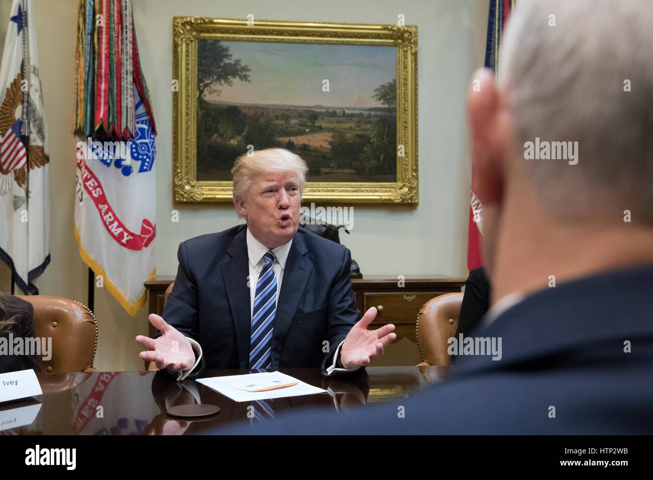 Washington DC, USA 13th March, 2017 US President Donald J Trump (Back) and US Vice President Mike Pence (Front) attend a meeting on healthcare in the Roosevelt Room of the White House in Washington, DC, USA, 13 March 2017 The House Republicans' bill known Stock Photo