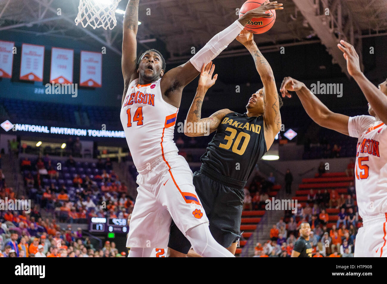 Clemson Tigers forward Elijah Thomas (14) blocks the shot of Oakland