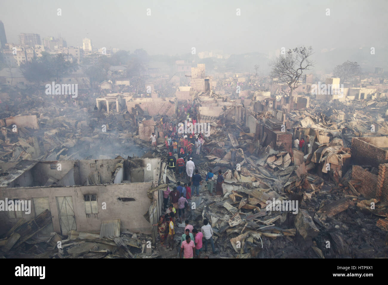 Dhaka, Bangladesh. 16th Mar, 2017. Many shanties at Korail slum razed to the ground by a fire that broke out at the early hours of Thursday, Dhaka, Bangladesh. More than 40,000 people have been affected as fire guts over 500 shanties at Korail slum in Dhaka's Mohakhali area today. Credit: Suvra Kanti Das/ZUMA Wire/Alamy Live News Stock Photo