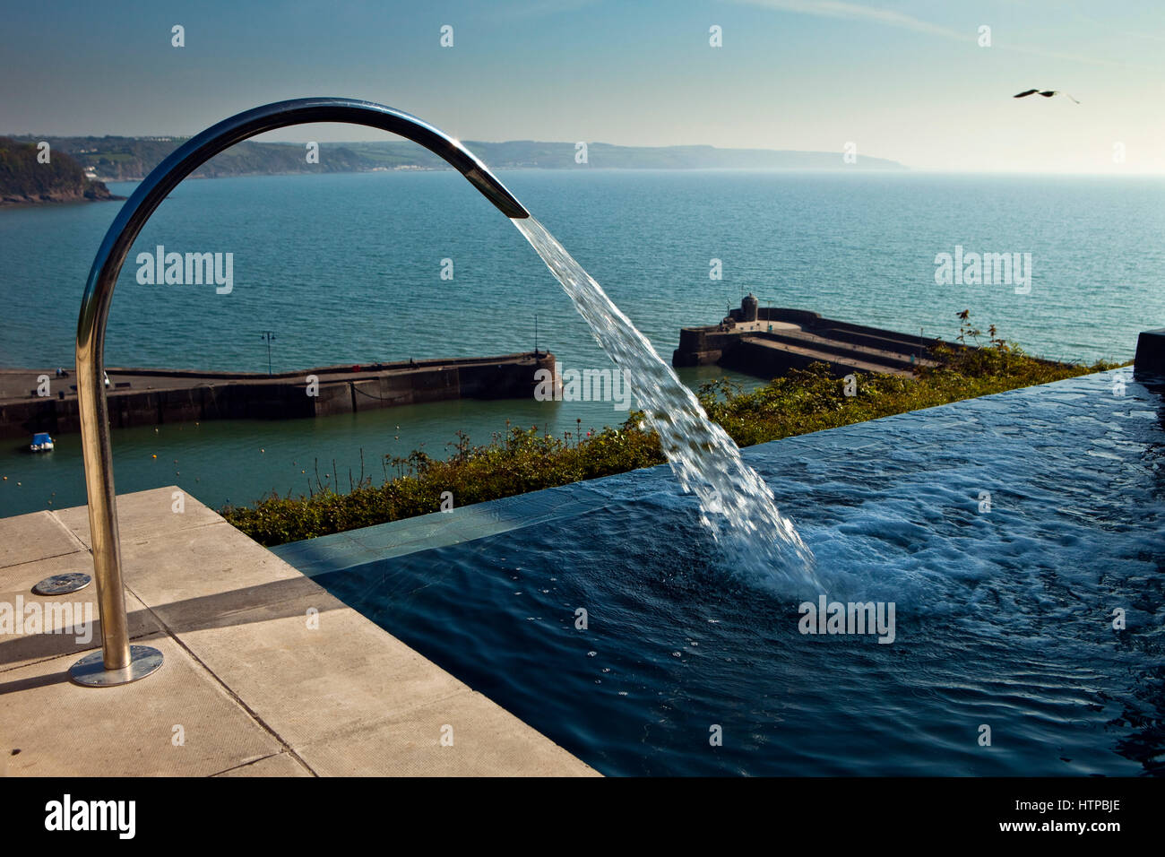 Water flowing in to infinity pool, St.Brides Spa Hotel, Saundersfoot, Pembrokeshire, Wales, Great Britain Stock Photo
