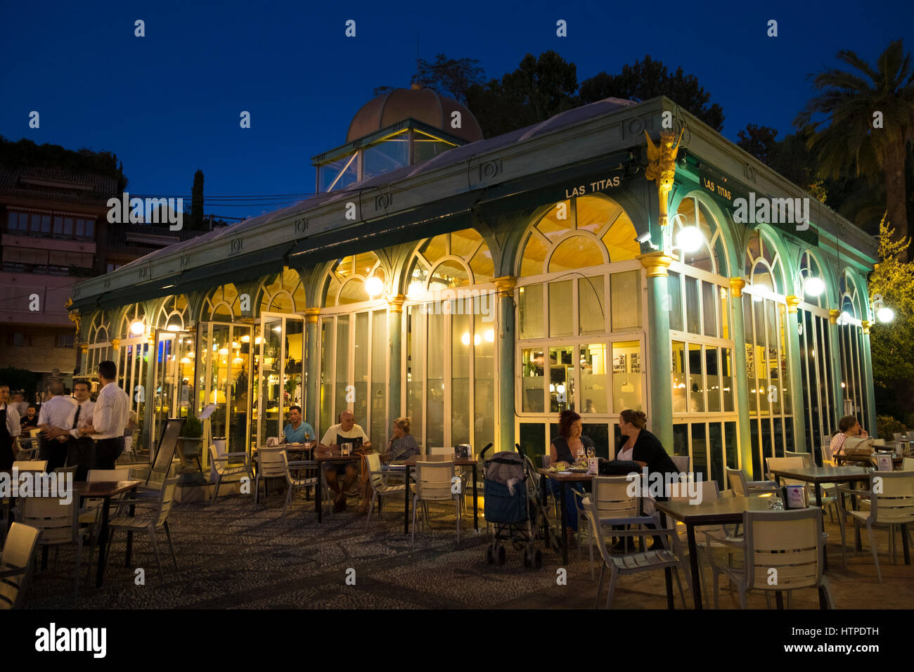 The Kiosko Restaurante Terraza Las Titas in the Plaza de Humillaredo on a  summer evening in Granada Spain Stock Photo - Alamy