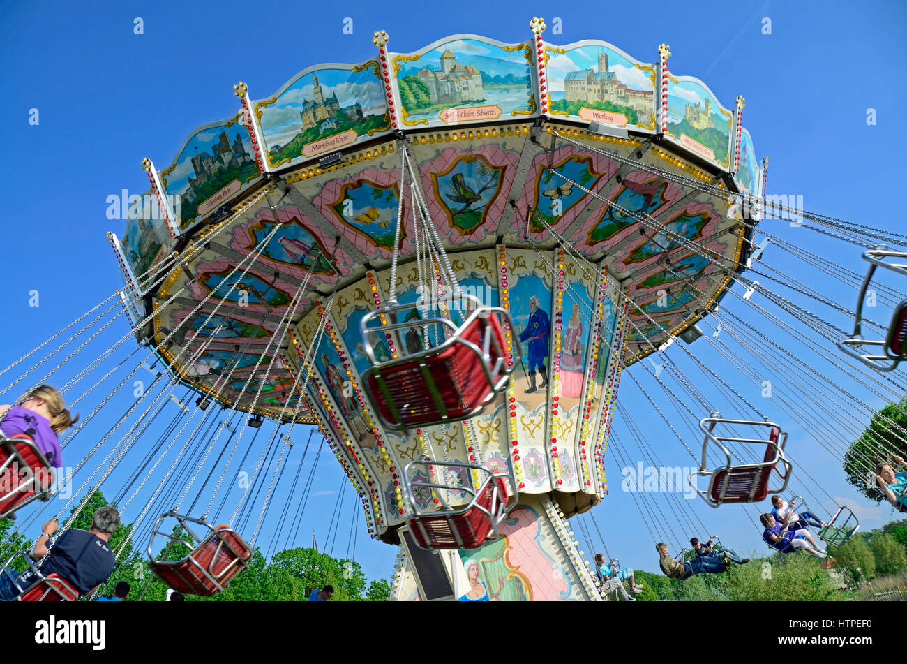 Amusement with a old carousel on festival 'Baumblütenfest' Werder (Havel) Brandenburg, Germany, Europe Stock Photo