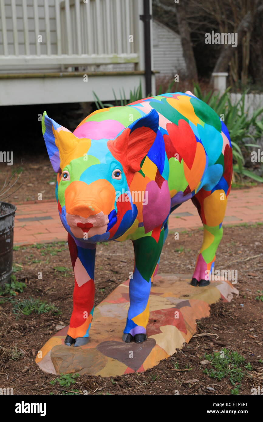 artistic Pig statue with painted hearts Stock Photo Alamy