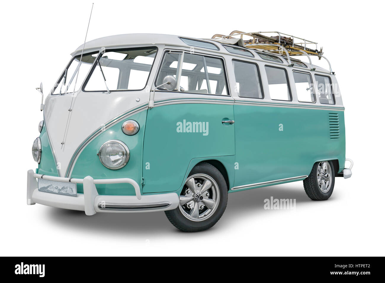 Side view of a  historic  van with baggage rack. Stock Photo