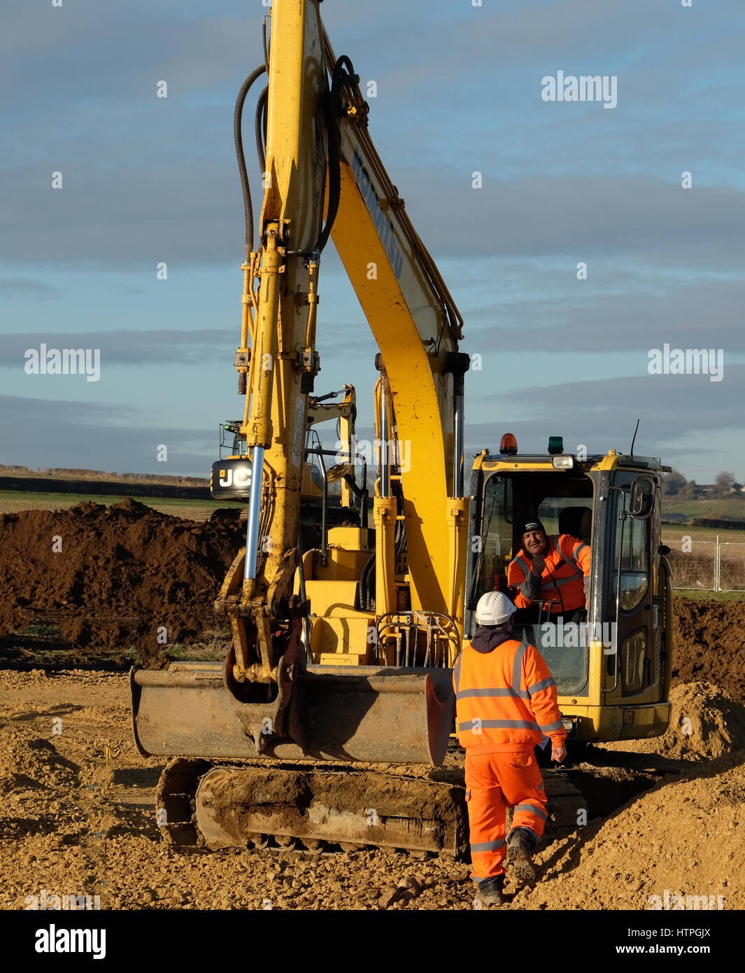 Heavy machinery used in the preparation of land for house building, Grantham Lincolnshire, England, UK. Stock Photo