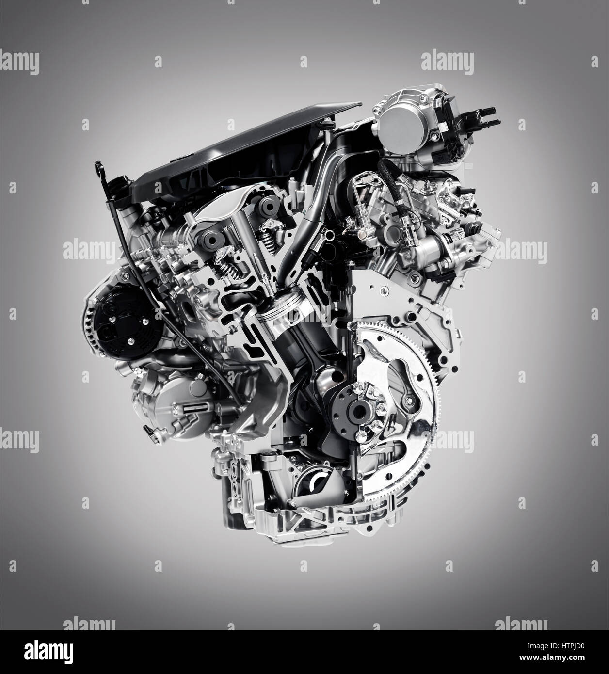 License available at MaximImages.com - Cross section of 2017 Buick Lacrosse 3.6L V6 VVT DI 310HP car engine showing the cylinder, piston and valves Stock Photo