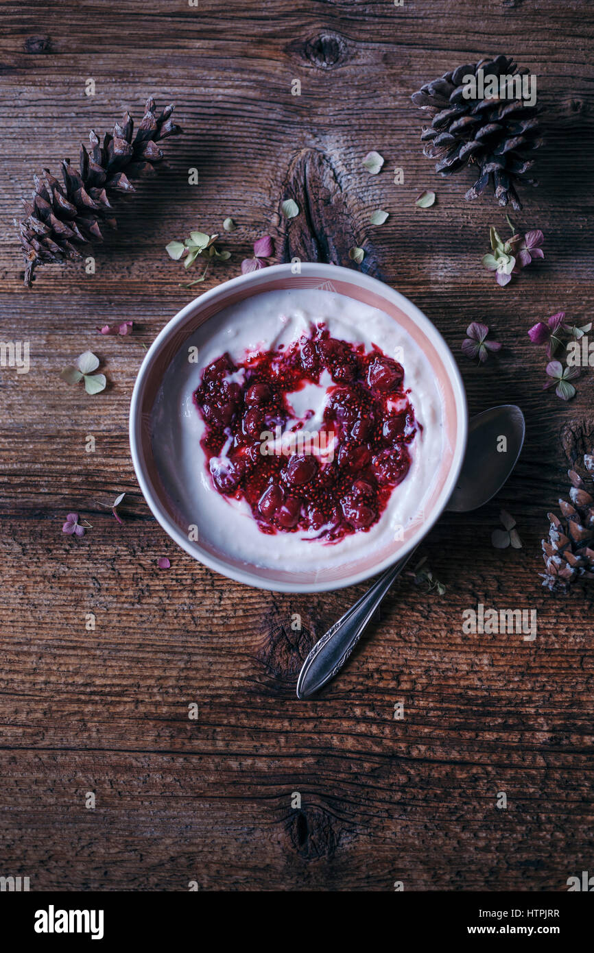 Yogurt with sour cherries jam drizzle Stock Photo