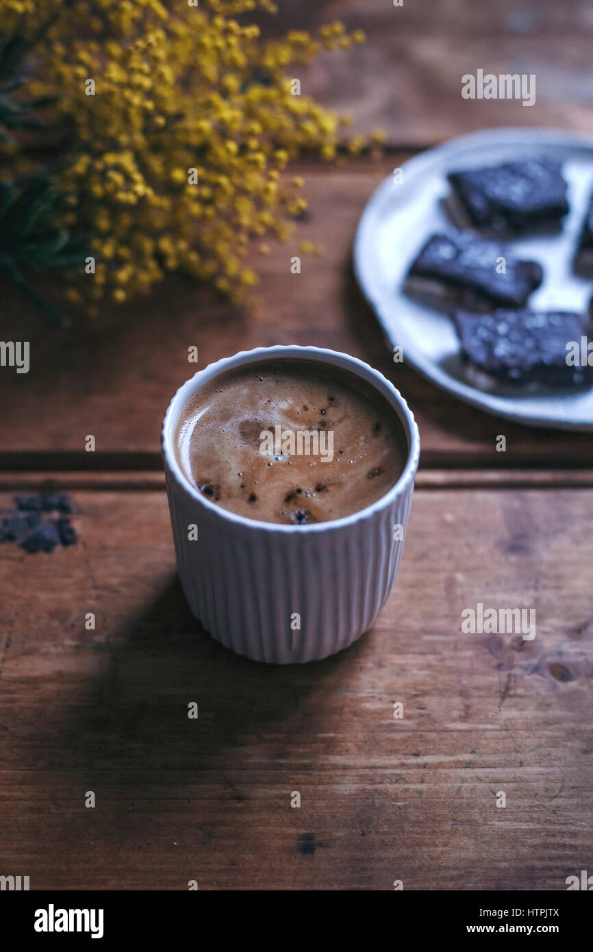 Cup of black coffee on a rustic wooden table Stock Photo