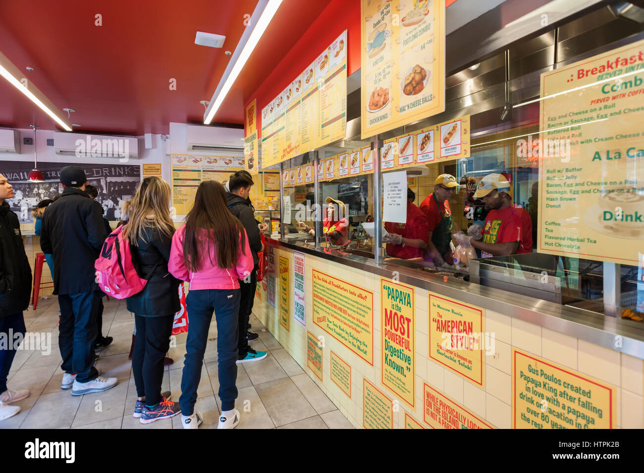 Customers pack the Papaya King store in Downtown Brooklyn in New York