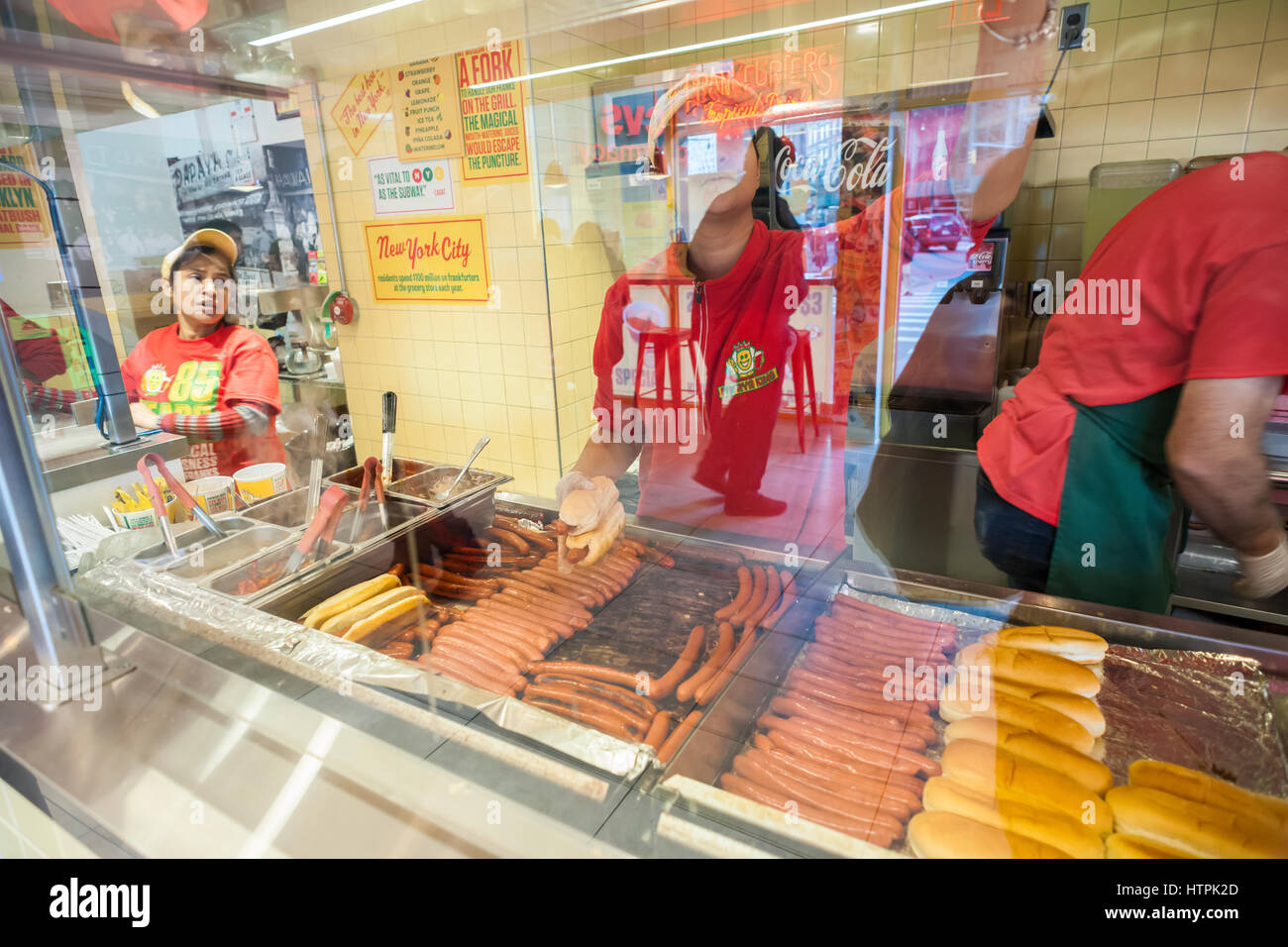 Customers pack the Papaya King store in Downtown Brooklyn in New York on Saturday, March 4, 2017