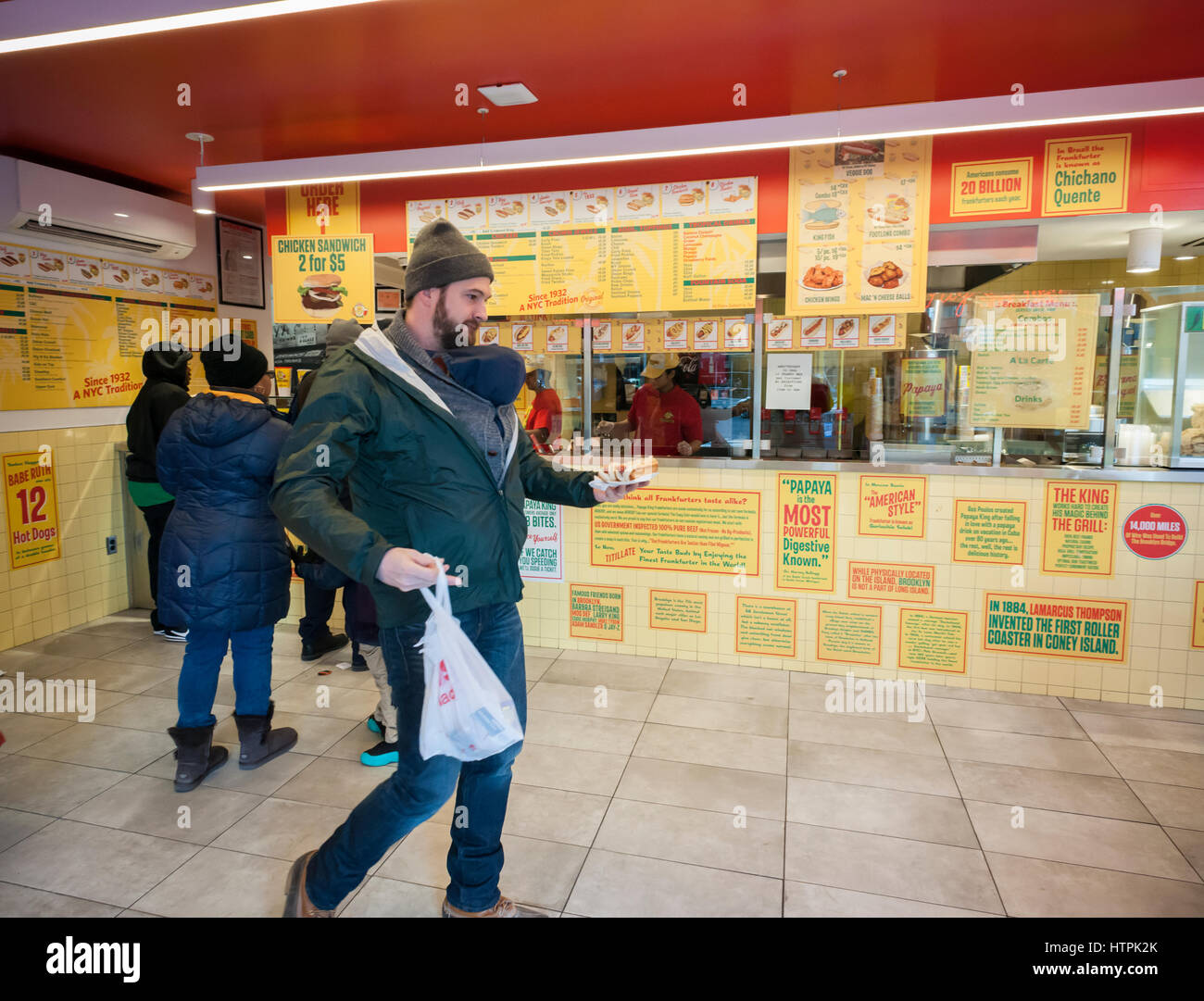 Customers pack the Papaya King store in Downtown Brooklyn in New York on Saturday, March 4, 2017