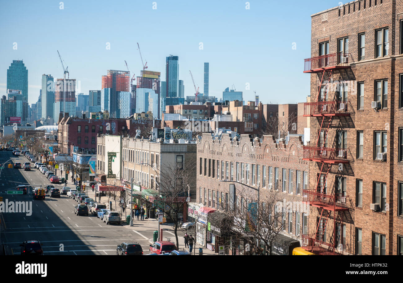 Development in Western Queens in New York blends into the Manhattan skyline with older buildings on Queens Boulevard in Sunnyside, Queens in the foreground on Sunday, March 5, 2017 (© Richard B. Levine) Stock Photo