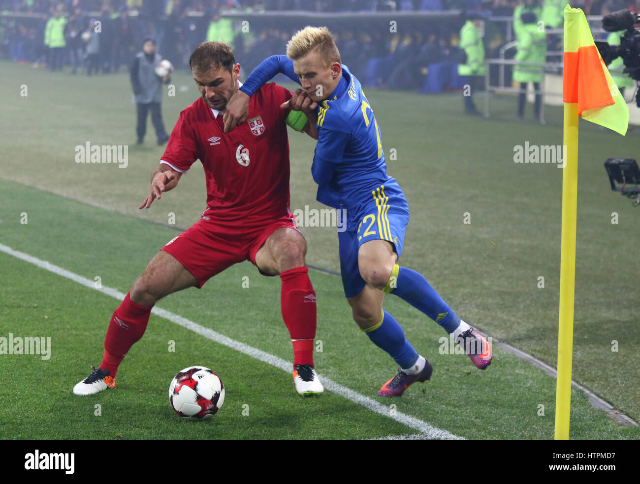 Ivan Petryak of MOL Fehervar FC dribbles between Franck Boli of